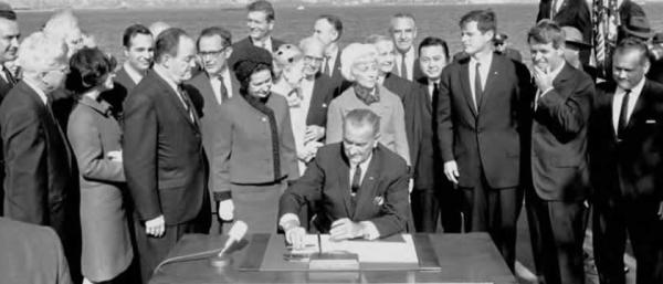 President Lyndon Johnson signs the 1965 US Immigration Act