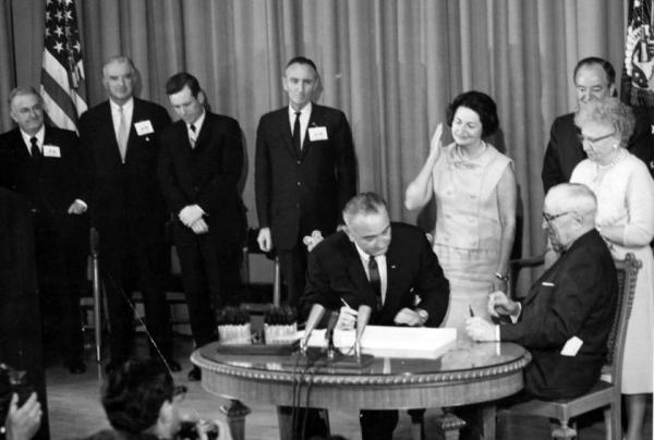 President Lyndon Johnson signs the 1965 US Immigration Act