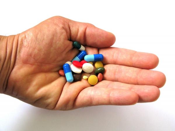 pills in hand image