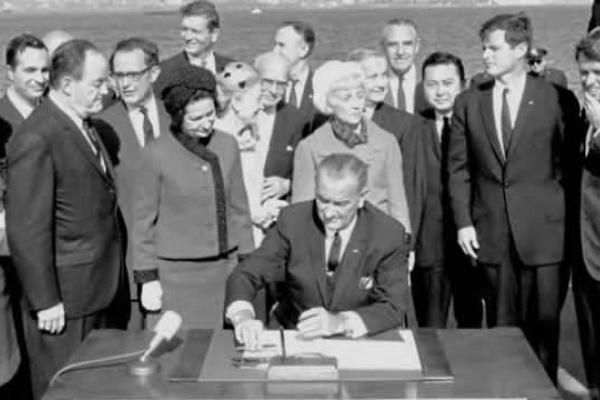President Lyndon Johnson signs the 1965 US Immigration Act