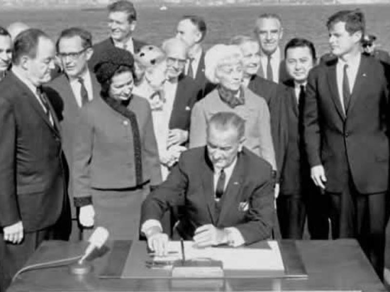 President Lyndon Johnson signs the 1965 US Immigration Act