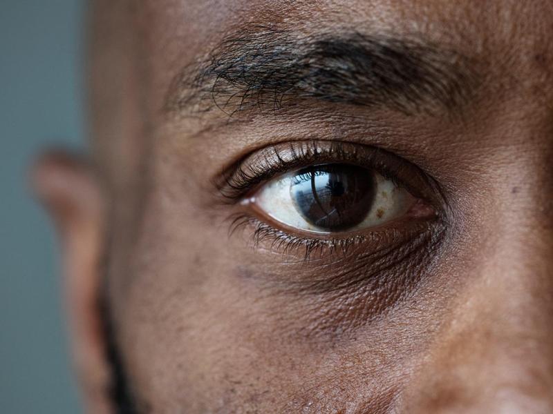 close up of a black american man's eye