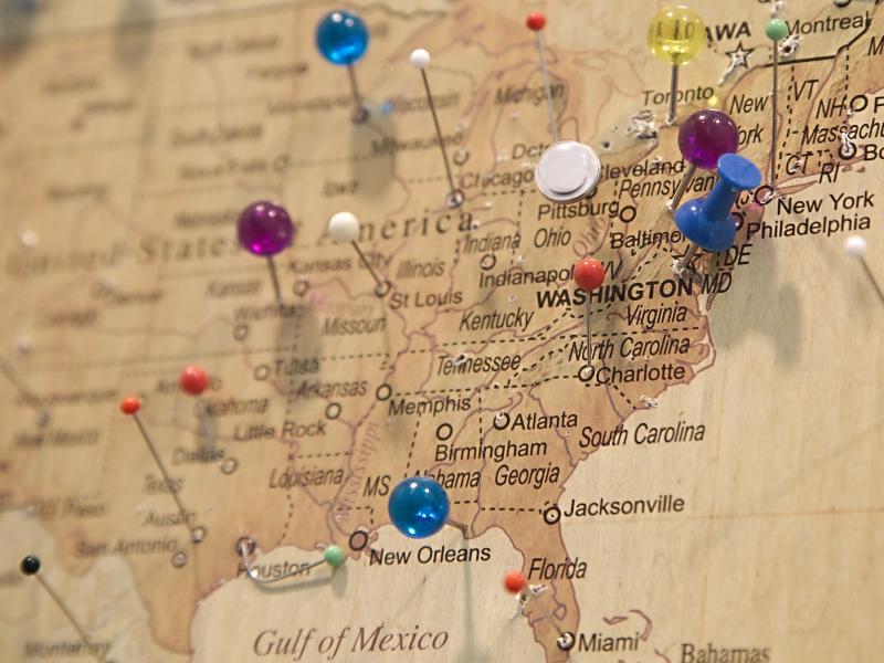 push pins on a map