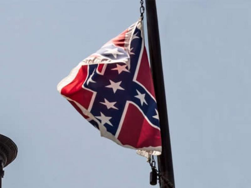Confederate flag flying over the capital building in South Carolina